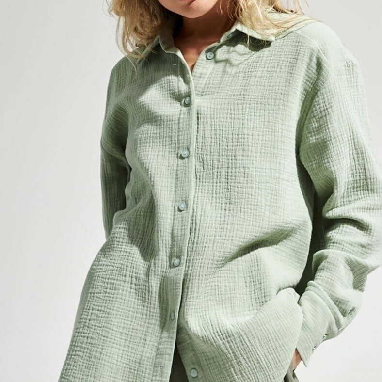 Women's loose long sleeve polo shirt, perfect for casual, comfortable everyday wear.