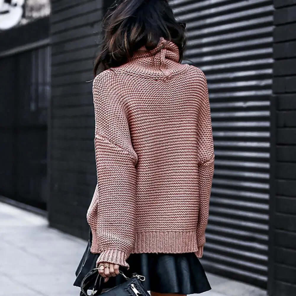 Stylish women's loose-fit roll neck turtleneck sweater, a comfortable and chic choice for casual wear.