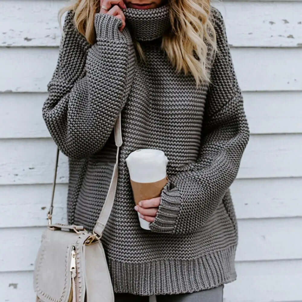 Loose fit women's roll neck sweater, a warm and stylish turtleneck pullover for fall & winter casual outfits.