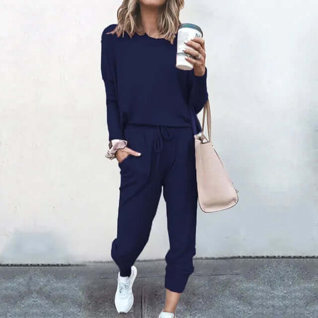 Soft fabric women's lounge set, featuring a loose-fit pullover and joggers for comfort.
