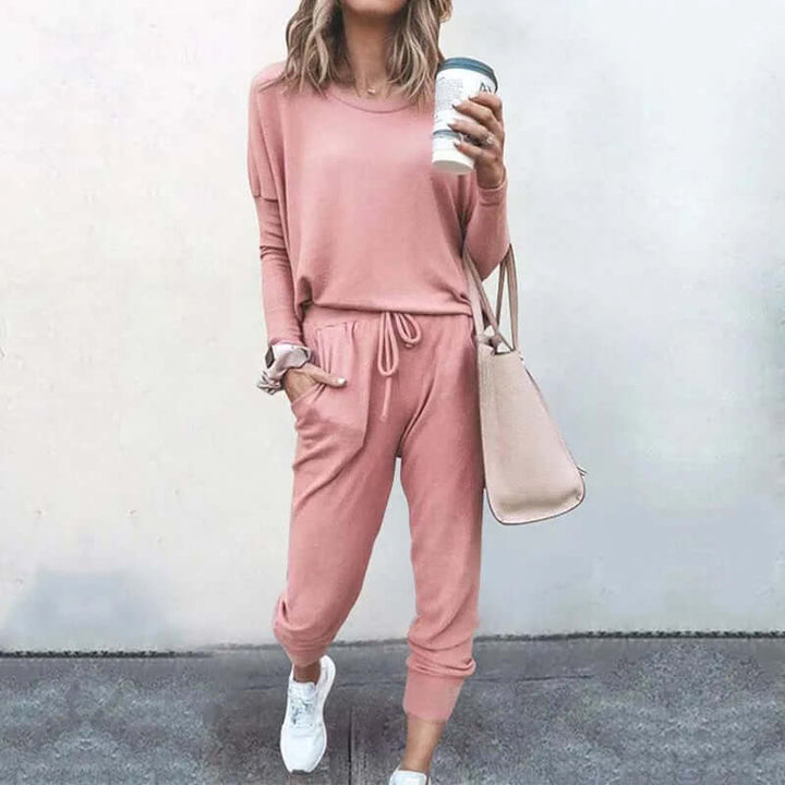 Woman wearing comfortable loose-fit jogger set, perfect for stylish everyday wear.
