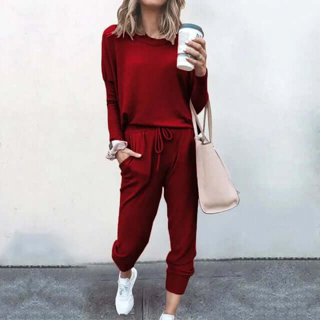 Women's loose pullover and jogger set, offering relaxed style and easy comfort.