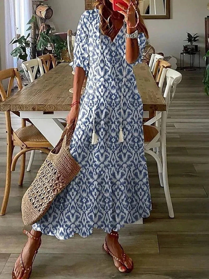 Women's Luna Long Boho Dress with unique leaf & stripe pattern, V-neck, half sleeves. Perfect for summer.