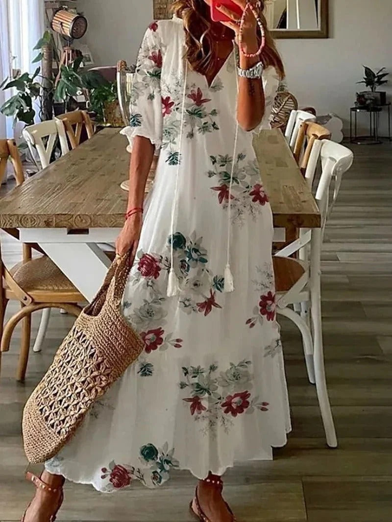 Comfortable women's Luna long boho dress, leaf & stripe pattern. Flowy half-sleeve maxi for warm seasons.