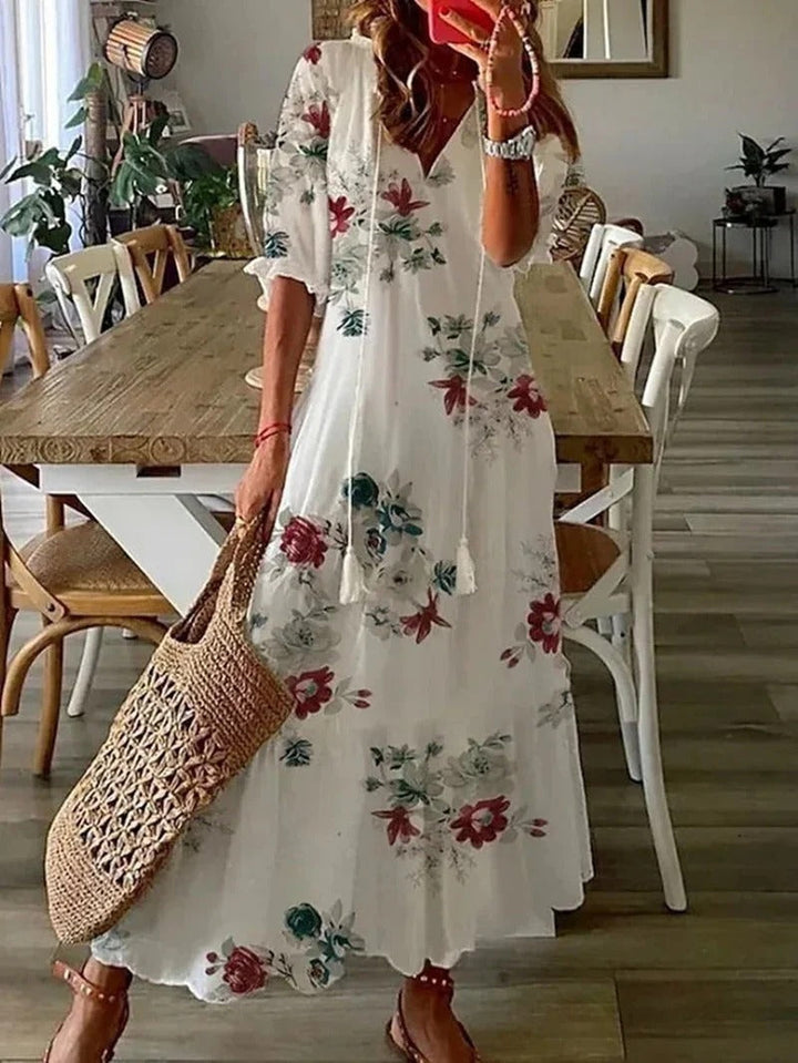 Comfortable women's Luna long boho dress, leaf & stripe pattern. Flowy half-sleeve maxi for warm seasons.