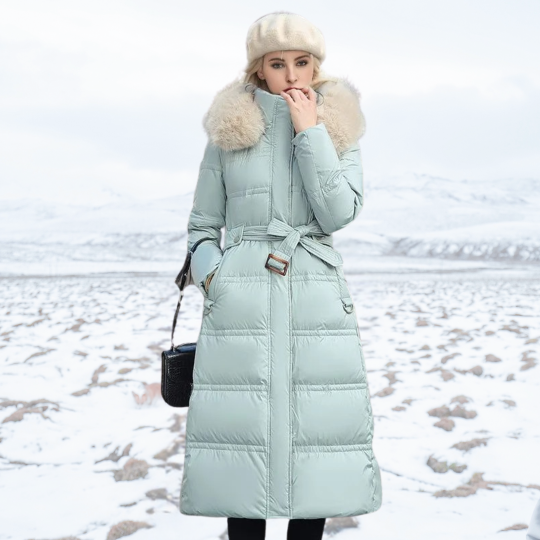 Opulent women's long faux fur coat, perfect for adding a touch of glamour to winter outfits.