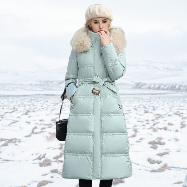 Opulent women's long faux fur coat, perfect for adding a touch of glamour to winter outfits.