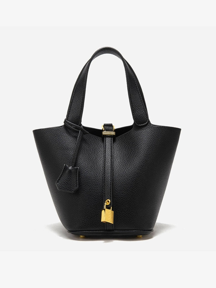 Women's luxe leather bucket bag in a chic neutral tone, perfect for everyday style and sophistication.
