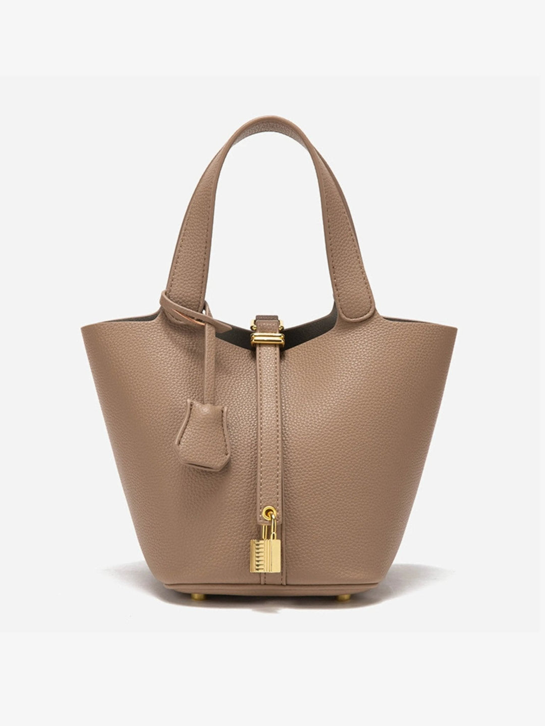 Modern women's leather crossbody bucket bag. Sophisticated accessory for on-the-go fashion.