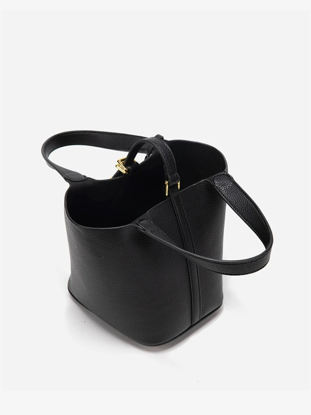 Elegant back view of the women's leather bucket bag, showcasing its sleek, modern design.