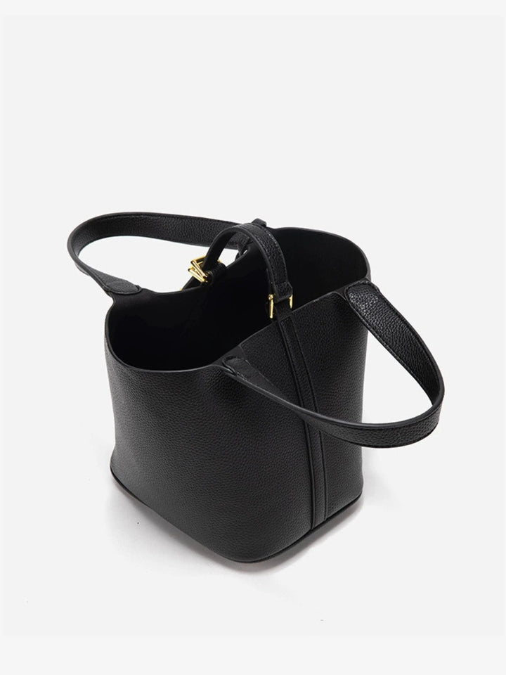 Elegant back view of the women's leather bucket bag, showcasing its sleek, modern design.