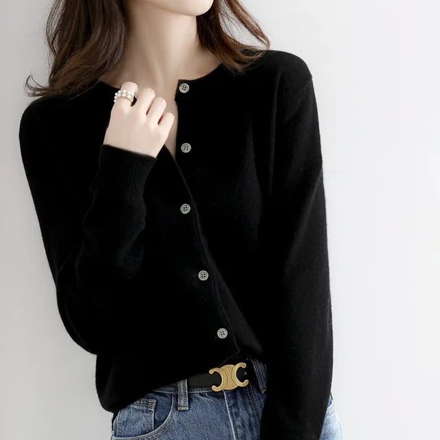 Premium women's soft cashmere button-up knit cardigan. Luxurious and warm for fall and winter.