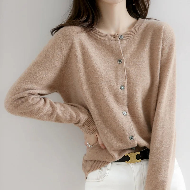 Luxuriously soft women's cashmere cardigan with buttons. A warm and elegant winter fashion essential.