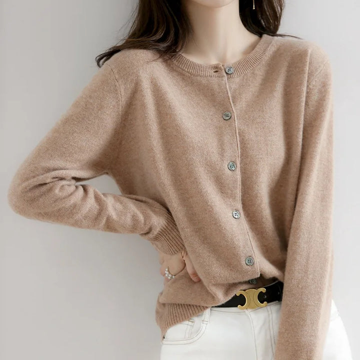 Luxuriously soft women's cashmere cardigan with buttons. A warm and elegant winter fashion essential.