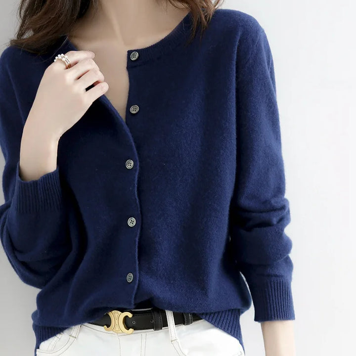 Women's incredibly soft cashmere button-up sweater, perfect for a cozy and chic layered look.