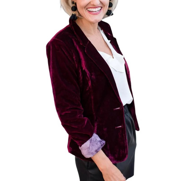 Luxurious women's velvet blazer, ideal for elegant formal or party wear. Chic long sleeve jacket.