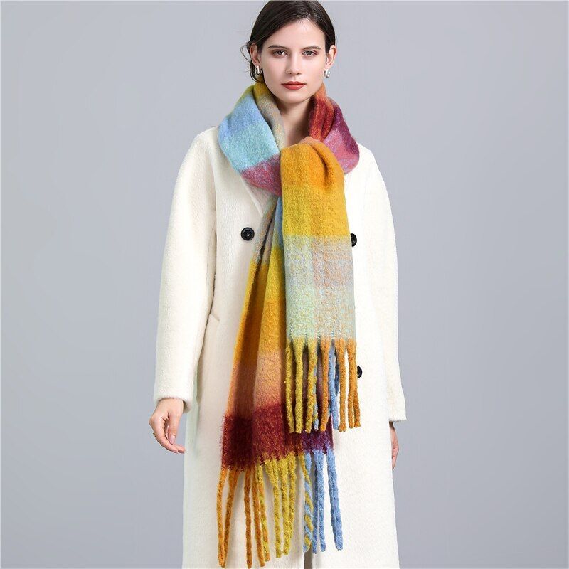 Women's luxury checked cashmere scarf, a stylish winter essential for warmth and fashion.