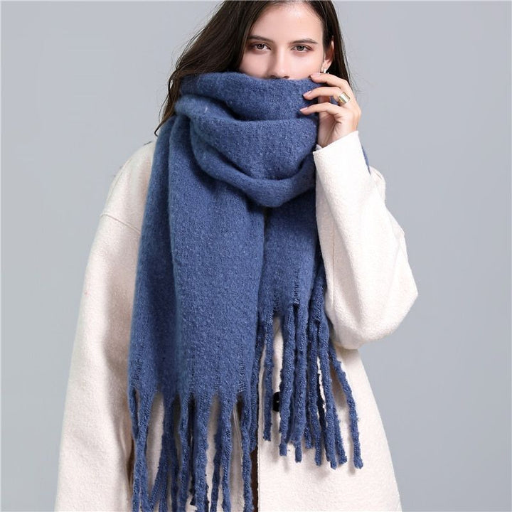 Stylish Carmie checked cashmere scarf, a luxurious accessory for women in winter.