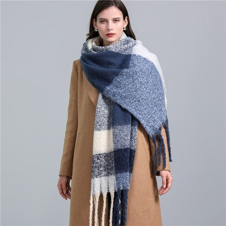 Luxurious women's checked cashmere scarf, providing ultimate warmth and style for winter.