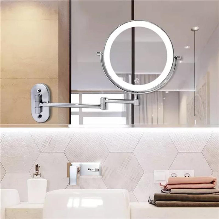 Close-up of a women's LED makeup mirror showing magnified reflection for detailed beauty and cosmetic tasks.