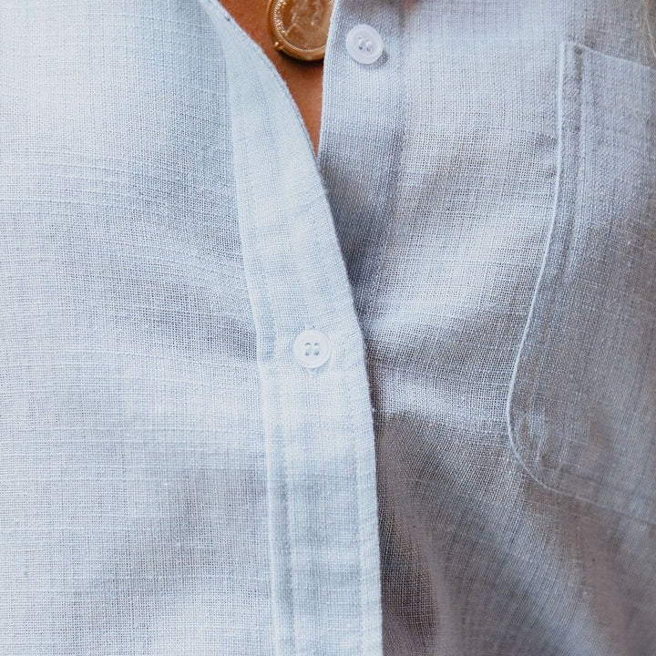 Stylish women's linen-cotton long sleeve blouse. Classic design with stand collar & practical chest pocket.