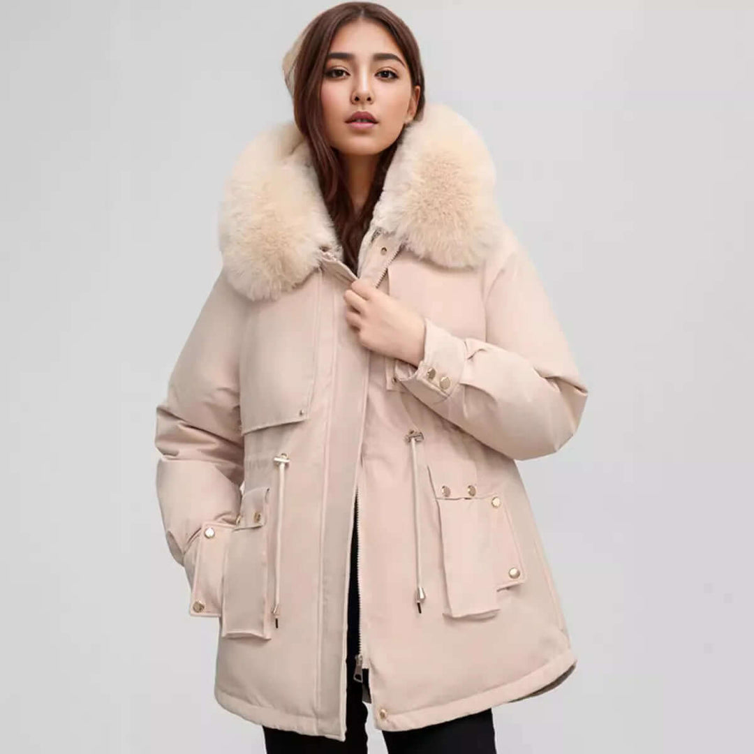 Elegant women's polyester winter coat featuring a chic faux fur collar. Warm & fashionable ladies jacket.