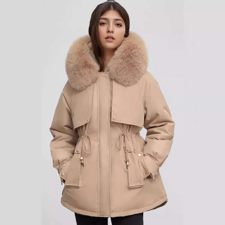 Warm mid-length women's winter coat with a stylish faux fur collar. Perfect cozy outerwear for cold weather.