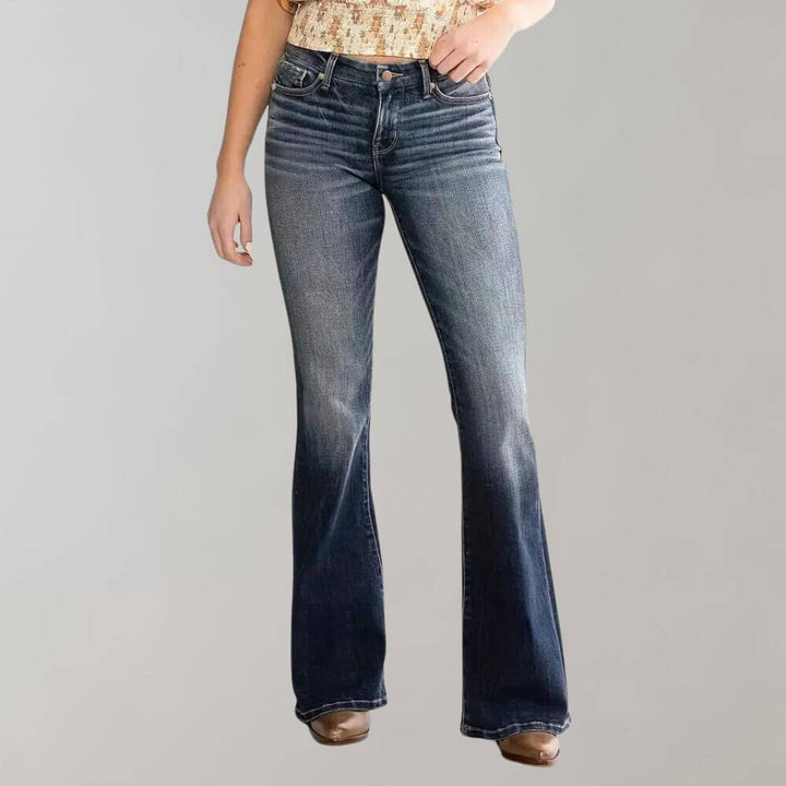 Versatile women's mid-waist stretch flared jeans, perfect for a chic retro-inspired look.