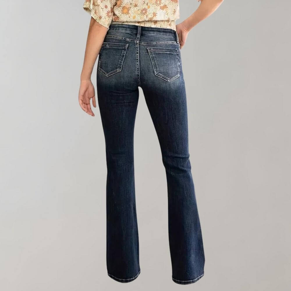 Women's slim fit flared jeans. Mid-waist, stretch denim for comfort & style. Blue fashion jeans.