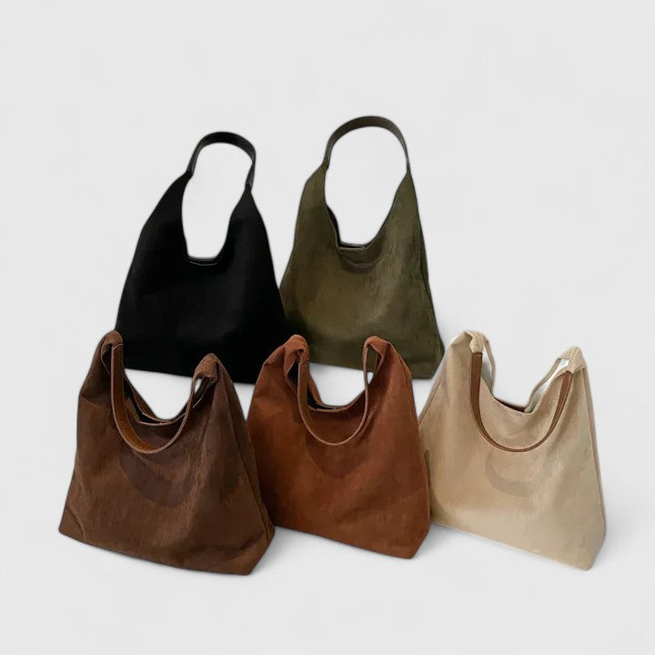 Women's minimalist everyday shoulder bag, elegant and versatile, perfect fashion accessory.