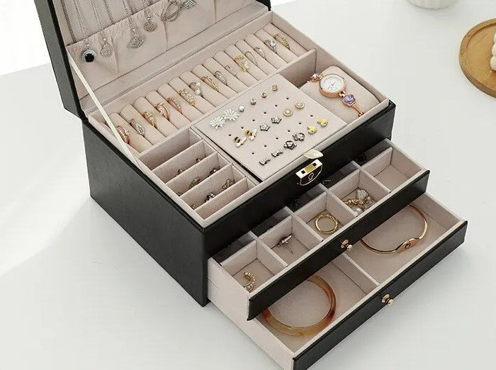 Pull-out tray of a multilayer jewelry organizer for women's small accessories & trinkets.