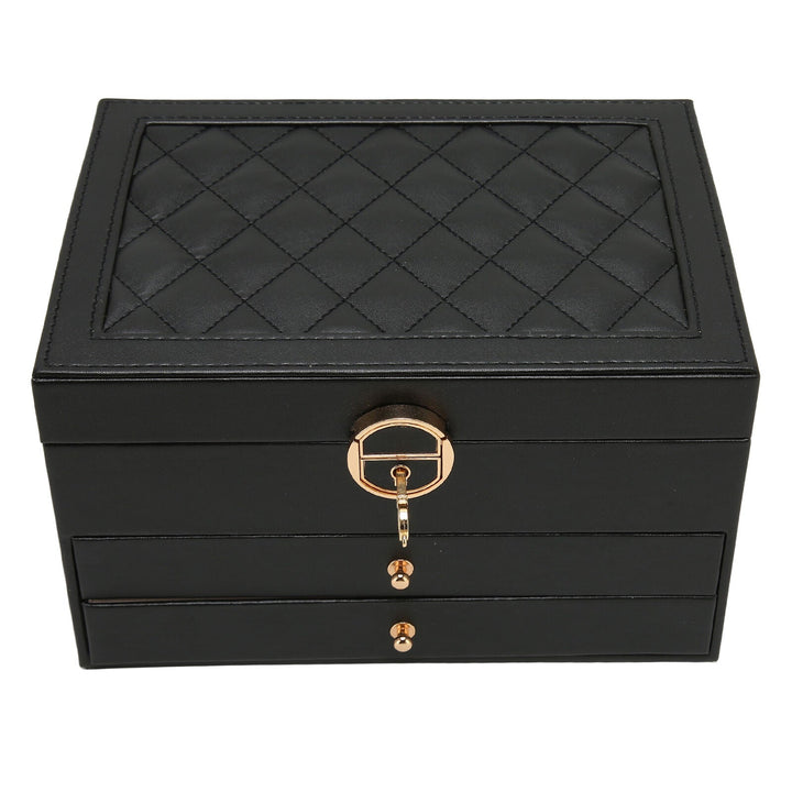 Detailed view of internal compartments in women's premium leather multilayer jewelry box.