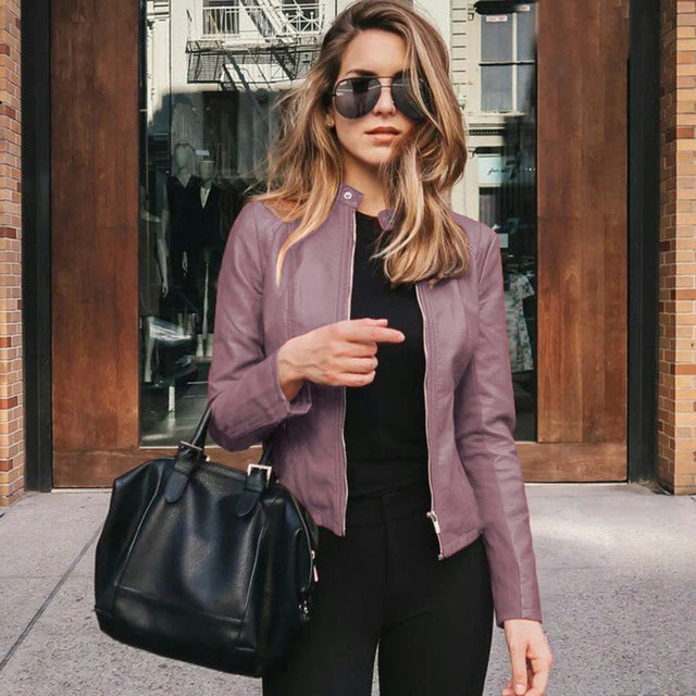 Elegant women's leather jacket, perfect for fall and spring, adding a touch of sophisticated style.