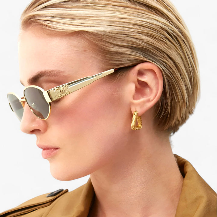 Women's Narella UV protection sunglasses with stylish black acetate frame. Perfect modern eyewear for summer fashion.