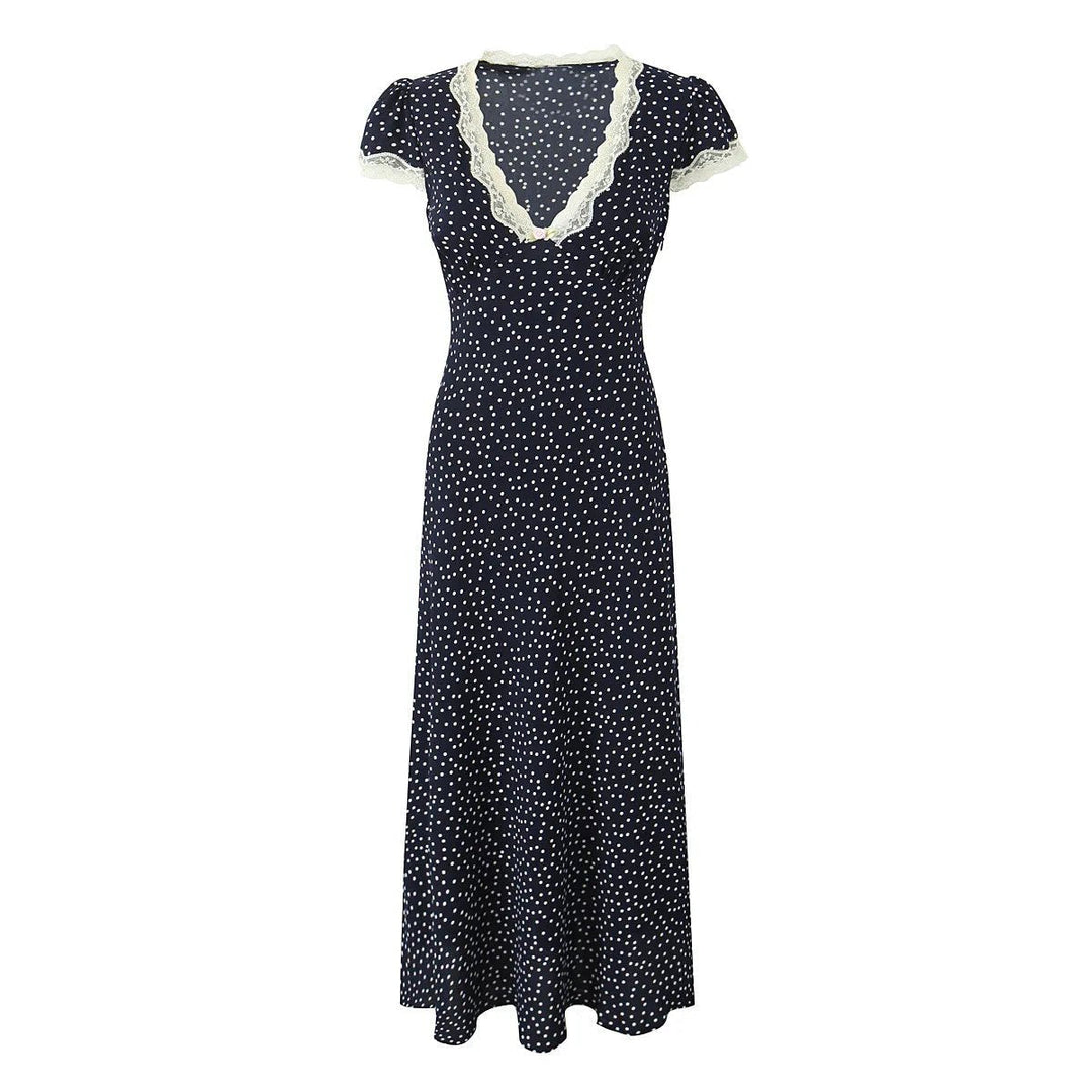 Stylish women's navy polka dot midi dress with flutter sleeves. Lightweight fabric, great for a chic summer casual look.