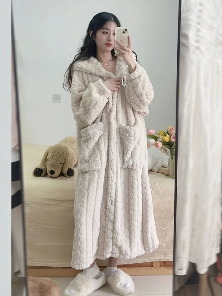 Soft & warm Amy Nightfall women's hooded bathrobe for ultimate loungewear comfort. Ideal for cozy relaxation.