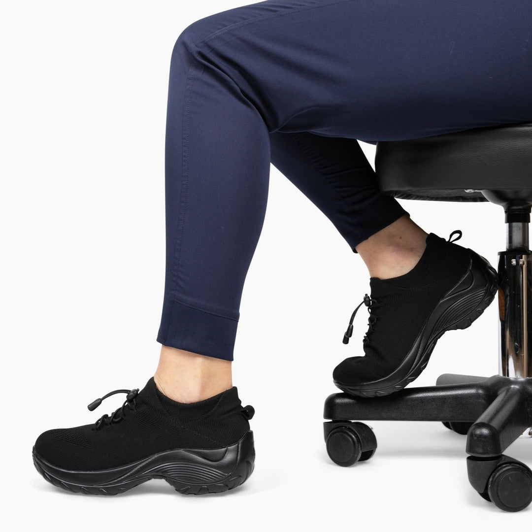Grey women's orthopedic work shoes, designed with cushion comfort and wide toe box