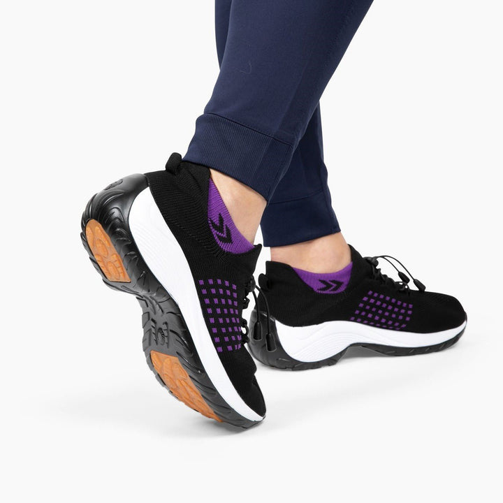 Detail of orthopedic cushion insole within women's healthcare work shoe for support