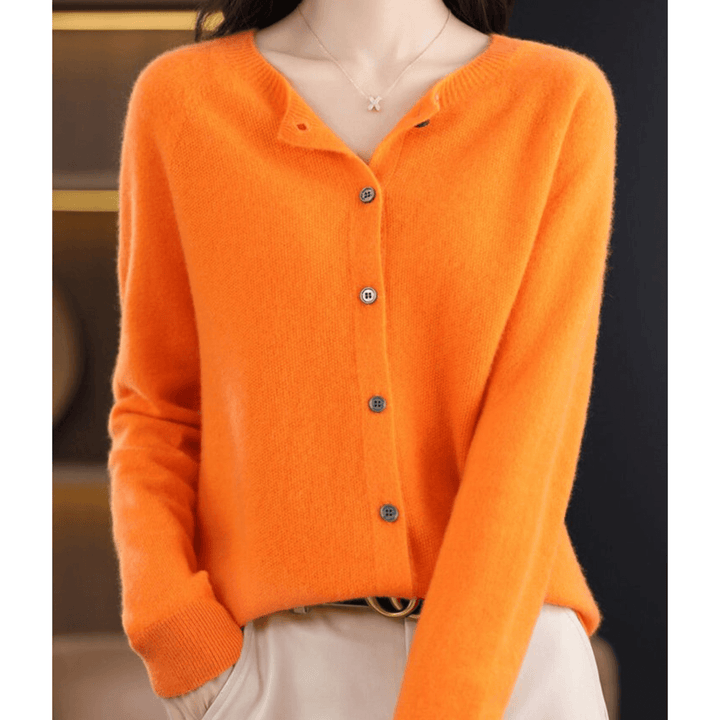 Classic O-neck women's sweater. Luxurious cashmere-like wool blend knit, perfect for cozy fall days.