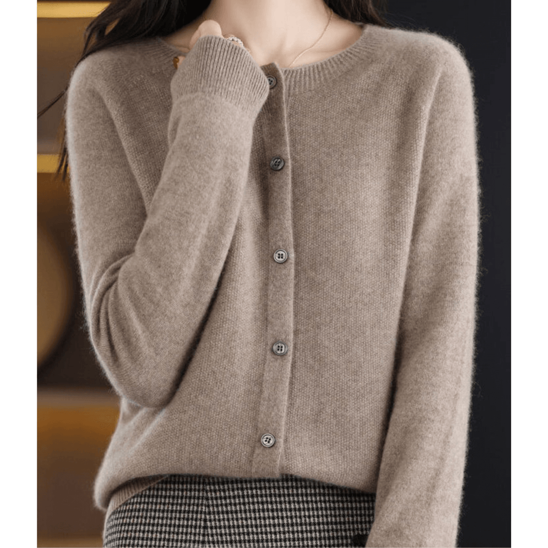 Soft women's O-neck pullover sweater. Cashmere-like wool blend, long sleeve, ideal for cold weather.
