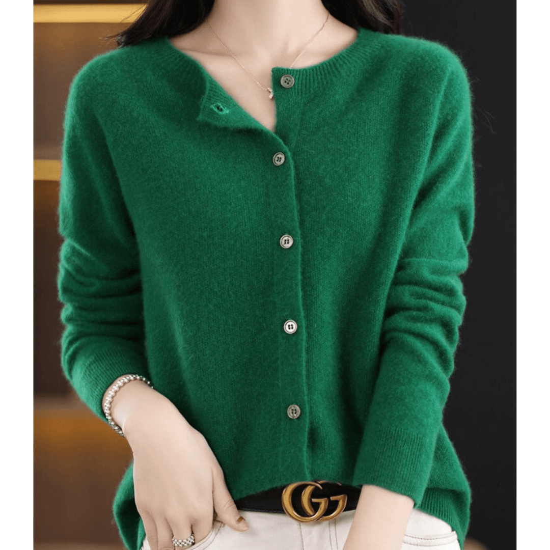 Elegant women's O-neck sweater. Luxurious cashmere-like wool blend, cozy and stylish winter fashion.