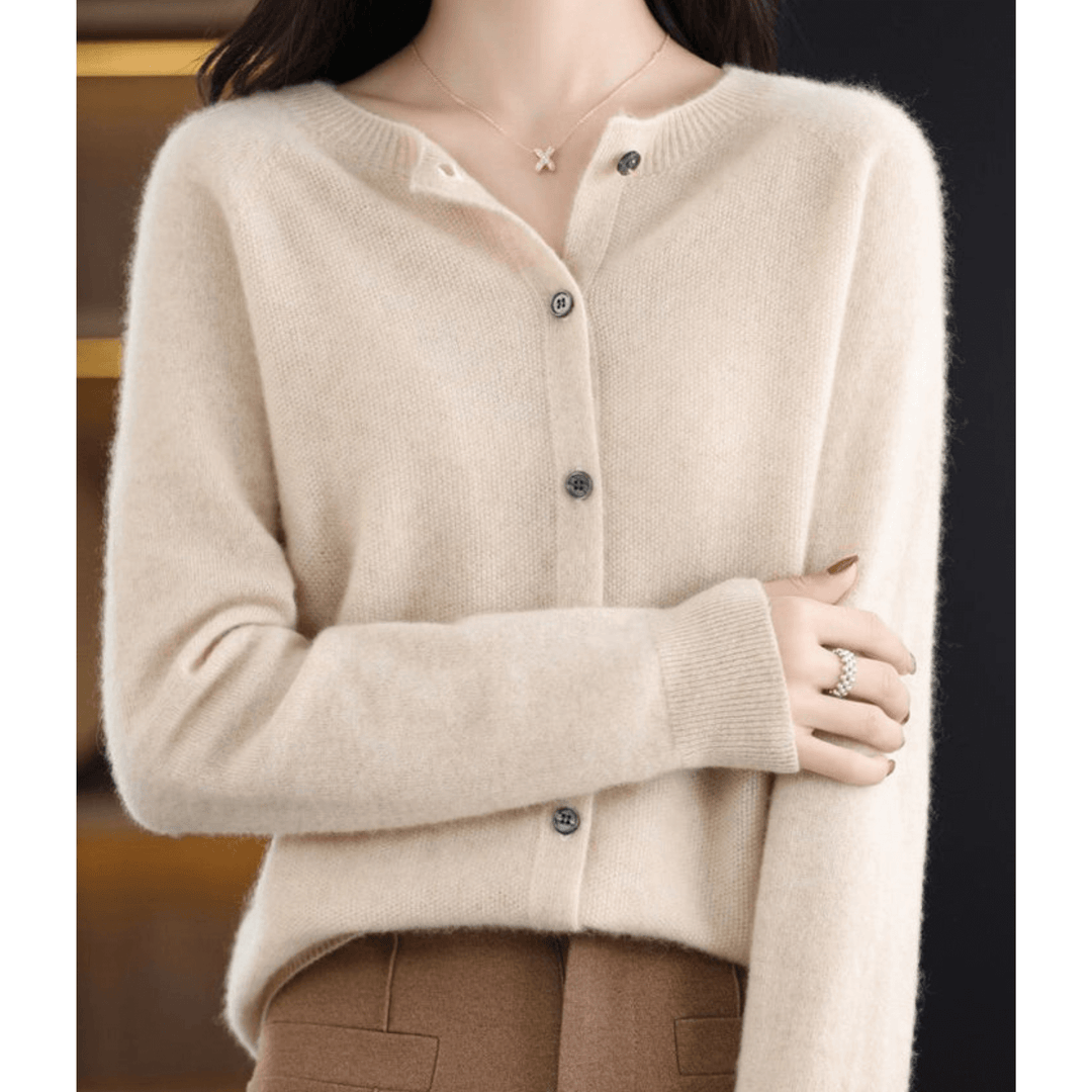 Warm women's O-neck sweater, soft cashmere-like wool blend texture. Ideal for everyday comfort.