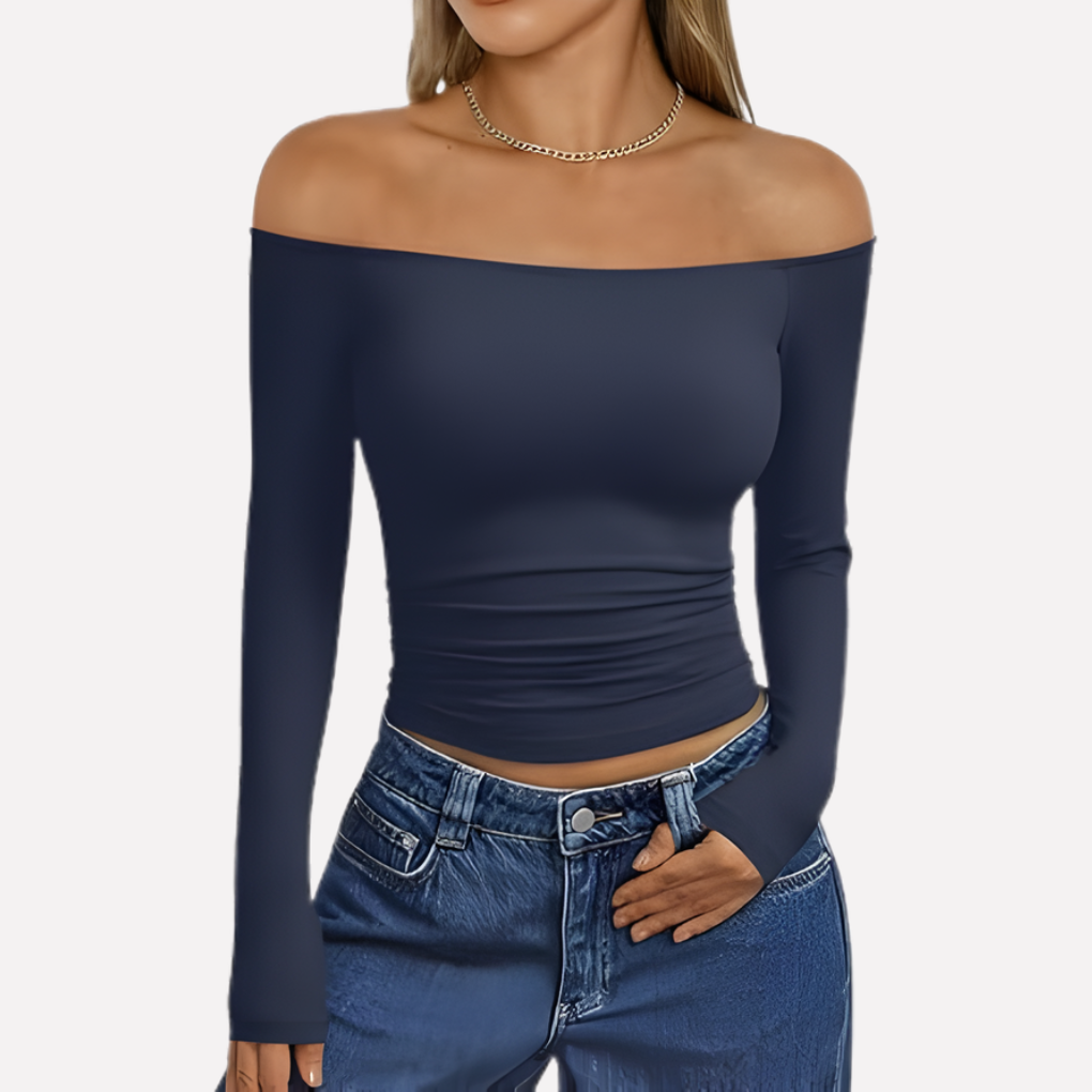 Confident style: women's off-shoulder long sleeve top, blending casual elegance with relaxed comfort.