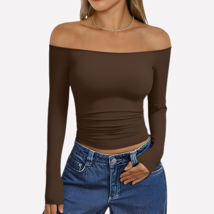 Model showcasing women's off-shoulder long sleeve top, highlighting its effortless style and comfort.