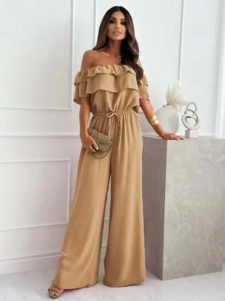 Comfortable women's off-shoulder wide-leg jumpsuit. Solid color, versatile for vacation or party wear.