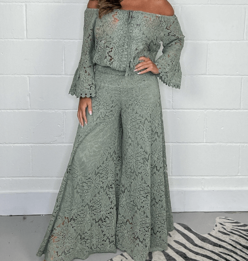 Stylish women's open-knit two-piece top & wide-leg pants set, ideal for a comfortable spring casual outfit.