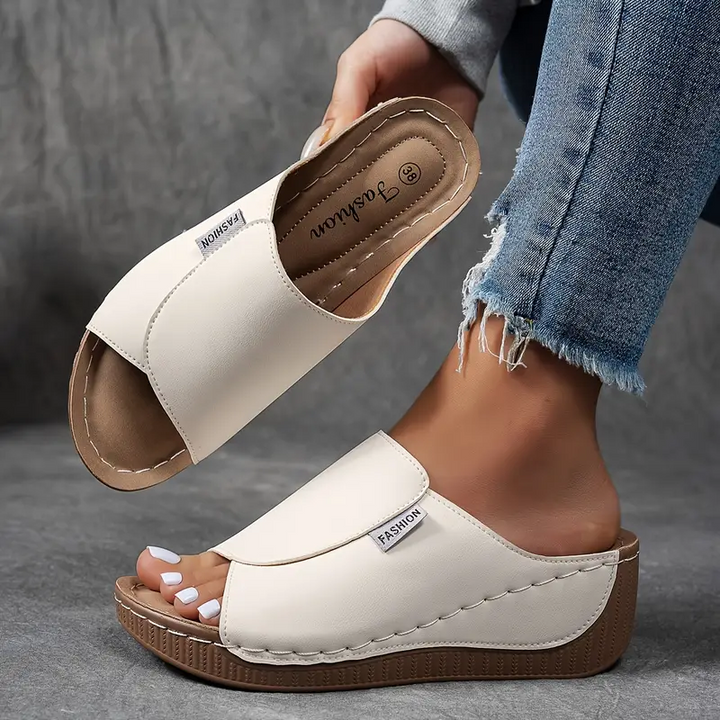 Women's open toe slip-on wedge sandals for comfortable summer fashion and warm weather.