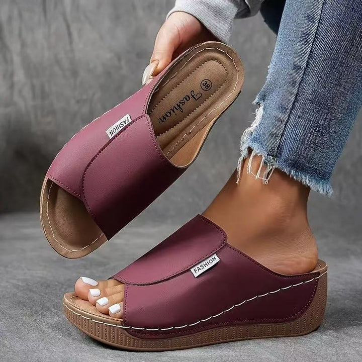 Elegant women's open toe slip-on wedge sandals, ideal comfortable footwear for summer events.