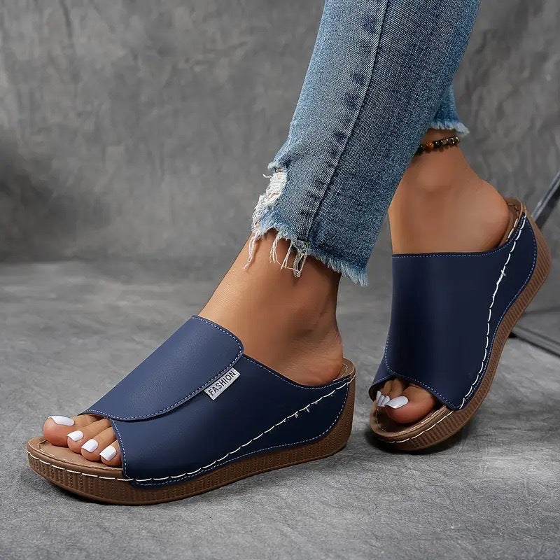 Chic women's open toe slip-on wedge sandals, essential summer footwear for comfort and style.