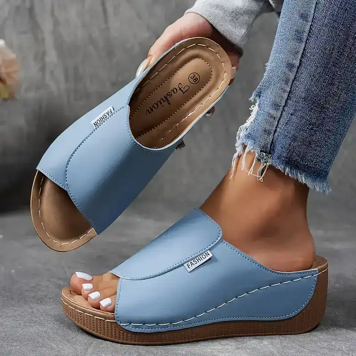 Lightweight women's open toe slip-on wedge sandals, versatile for casual or elegant summer fashion.
